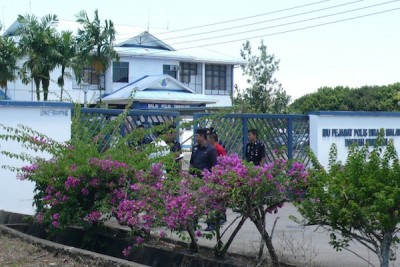 Gates are closed at the Simunjan police station during the day of the arrest