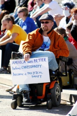 A person with disability exercising free speech at the Rally for Sanity, St. Louis City, USA. | Credit: Ka Ea