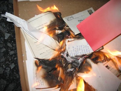 Hey look! Somebody's destroying a marriage certificate! Is it to keep the second marriage secret from the first wife?