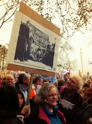 A protester showed interest in one of the historical placards. 