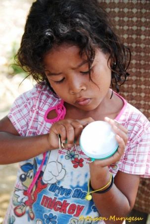 Orang Asli Girl Light Bulb Project Light A Home